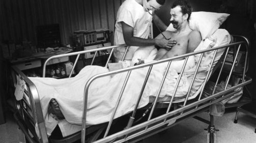patient having heart rate taken 1954