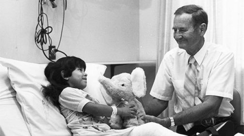 man with young patient in hospital room 1965